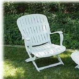White Plastic Patio Chair — White moulded resin